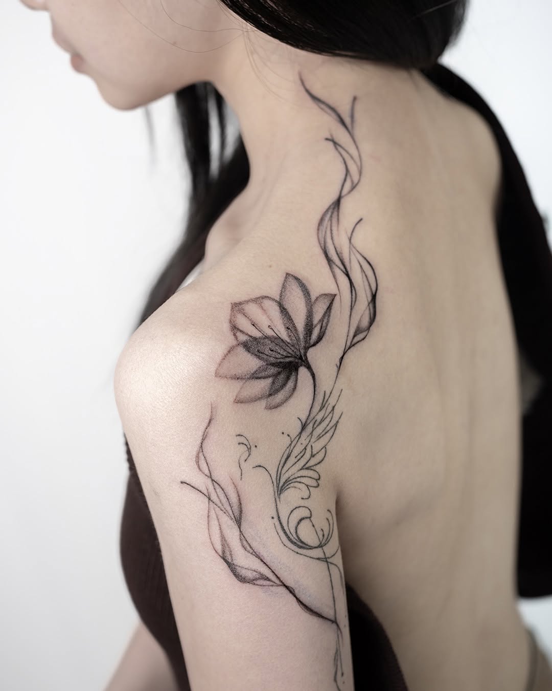 Lotus Addition, tattoo by Michaela